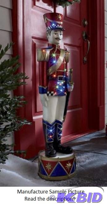 lot 19 image: Holiday Soldier with LED Lights - With his co...