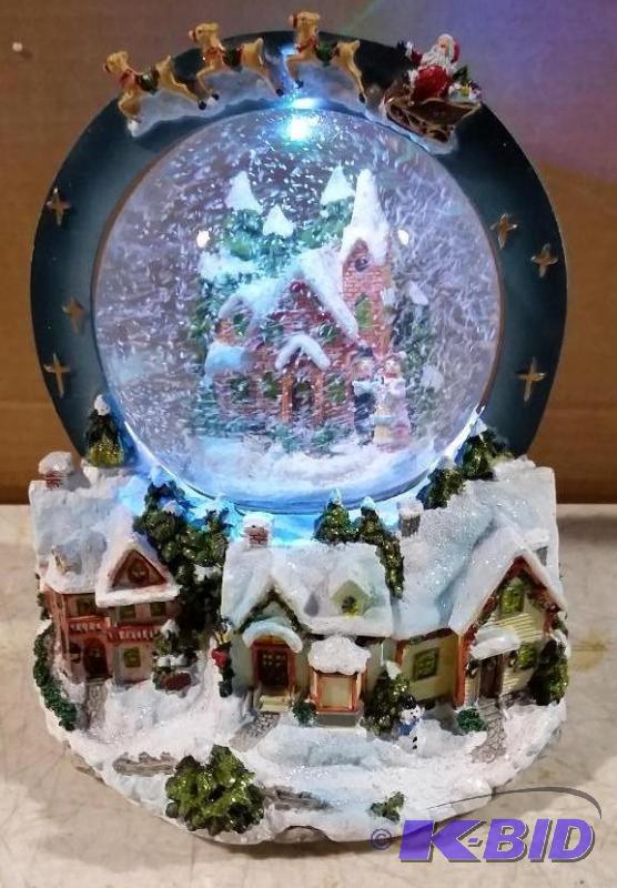 lot 2 image: Christmas Snow Globe - Lights up - Whirls sno...