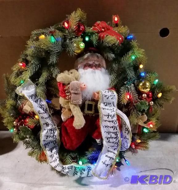 lot 22 image: Lighted Santa Wreath - 24" diameter - Re...