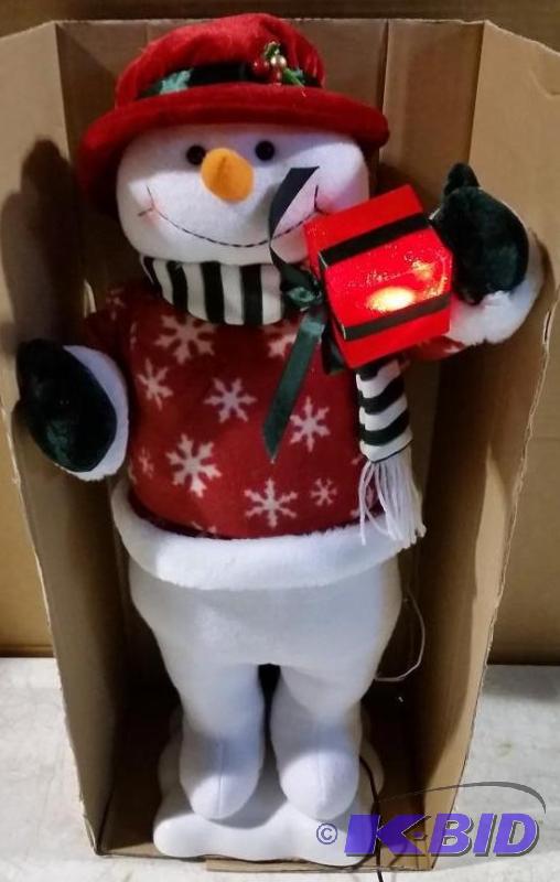 lot 4 image: Moving Snowman - Holds a light up present - 2...