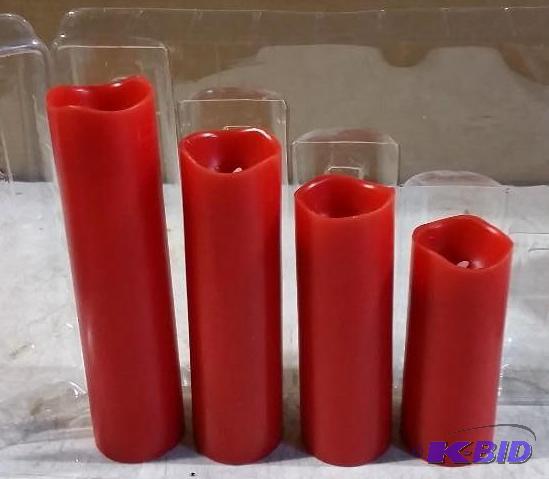 lot 61 image: Four Piece Flameless Candle Set - Red - One 5...