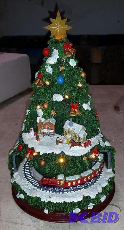 lot 86 image: Musical Lighted Tree with Train - Train goes ...