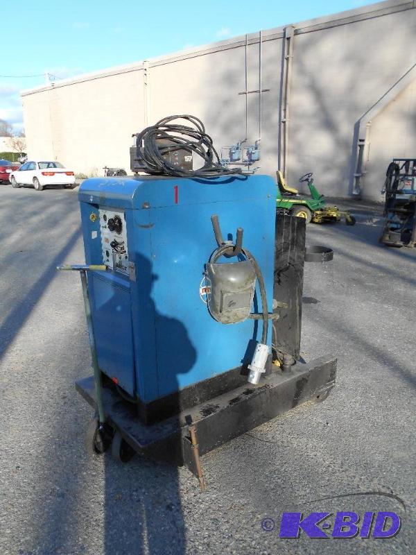 lot 14 image: Miller 330A BP Arc Welder. Includes Cart and Pedal.