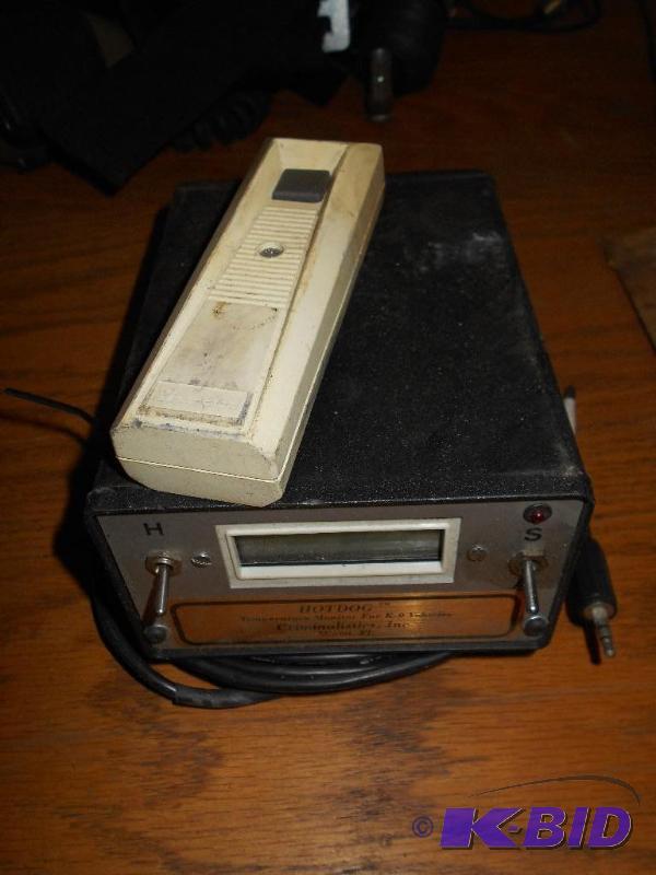 lot 15 image: Criminalistics Hotdog Canine System. K9 Door Opener and Temp. Monitor