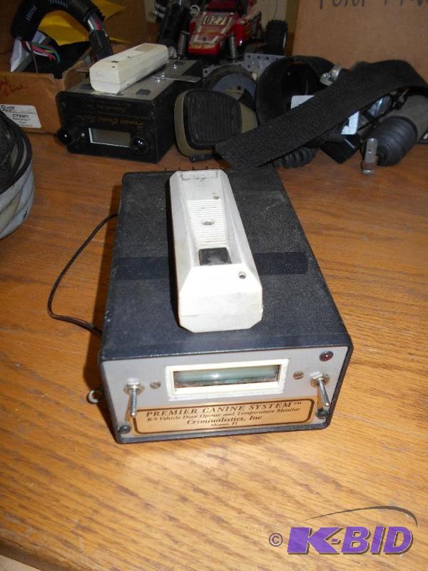 lot 17 image: Criminalistics Hotdog Canine System. K9 Door Opener and Temp. Monitor