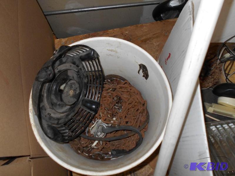 lot 60 image: Tire Chains, Engine Parts, and Bungee Strap