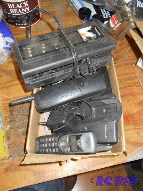 lot 77 image: Box of Phones and a Battery Charger.