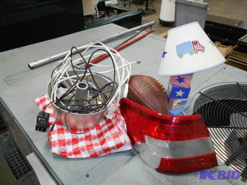 lot 88 image: Football, Lincoln MKZ Tail Light, Light, and More..