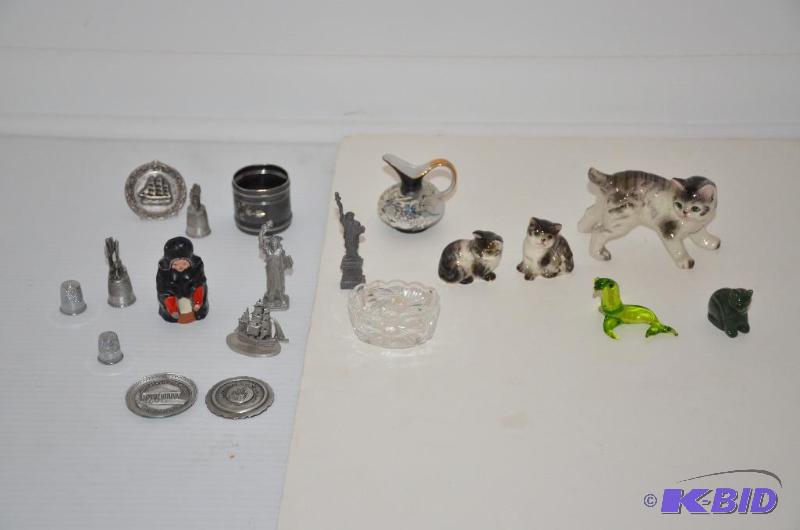 lot 103 image: Green glass walrus, jade cat, collectible thi...