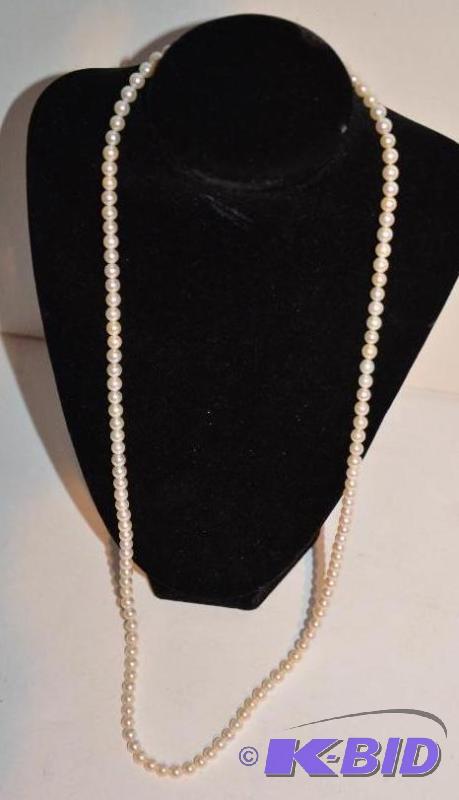 lot 180 image: 14k gold necklace. Maybe pearls, please inspe...