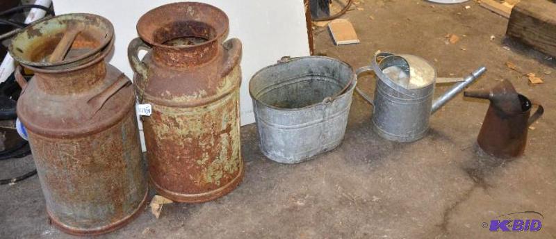 lot 27 image: two milk cans, two tin cans,1 small can with ...