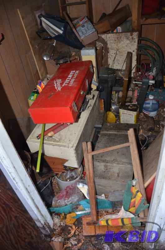 lot 58 image: Small storage shed filled with items from 192...