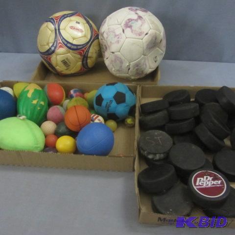 lot 98 image: Hockey Pucks, Balls