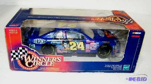 lot 115 image: Race Car - #24 Jeff Gordon - Dupont - Superma...