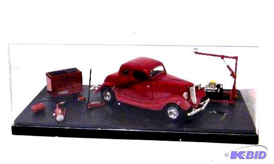 lot 73 image: 1934 Ford Coupe - 125th scale - Model 40-000...