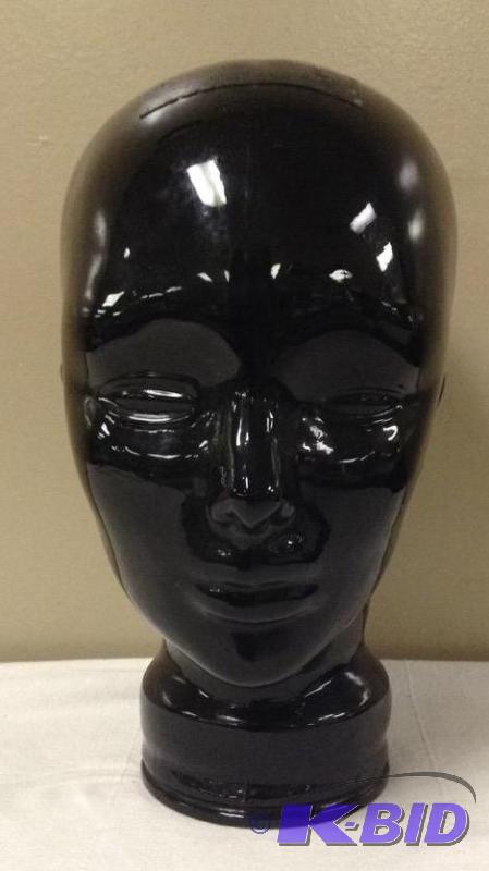 lot 24 image: Black Glass Head Mold