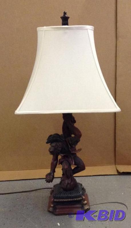 lot 4 image: Old World Monkey Table Lamp