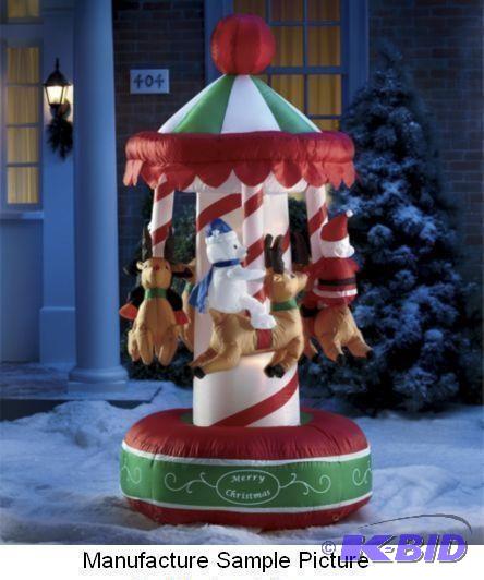 lot 43 image: Inflatable Christmas Merry Go Round  - Everyo...