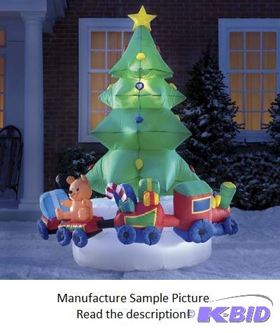lot 51 image: Inflatable Lighted Christmas Tree and Train -...