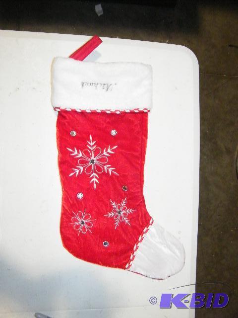 lot 62 image: Christmas Stocking - Has been personalized up...
