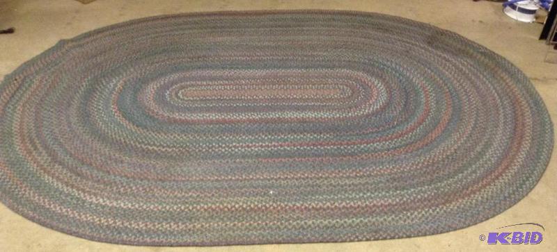 lot 102 image: Large Multi-Colored Braided Rug