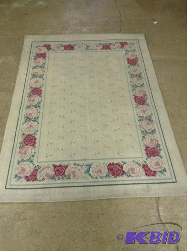lot 104 image: Cream Rose Rug