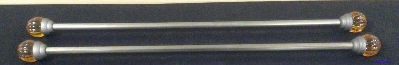 lot 150 image: 2 Amber Sphere Curtain Rods