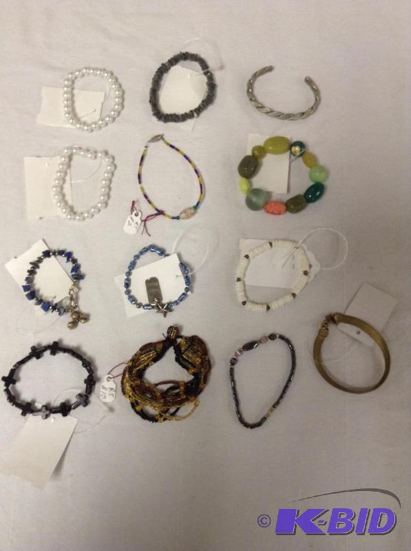 lot 38 image: 13 Fashion Bracelets