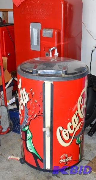 Round Coca-Cola Cooler on wheels with 