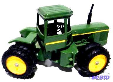 lot 46 image: John Deere Tractor - by Ertl - Made in USA - ...