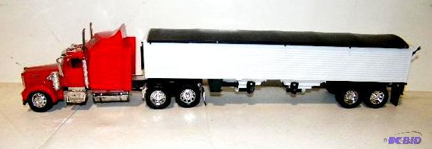 lot 47 image: Kenworth Semi with Trailer - Cast iron and pl...