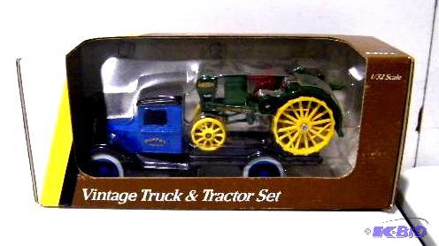 lot 48 image: John Deere Vintage Truck and Tractor Set - &q...