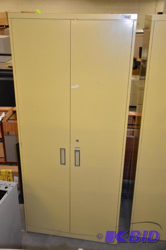 lot 113 image: Metal storage cabinet 36x24x81".Locked w...