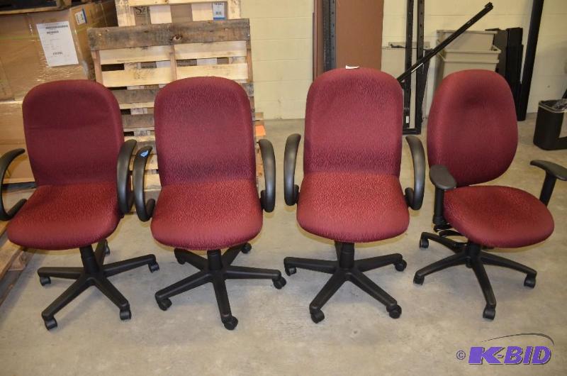 lot 135 image: 4 red office chairs...