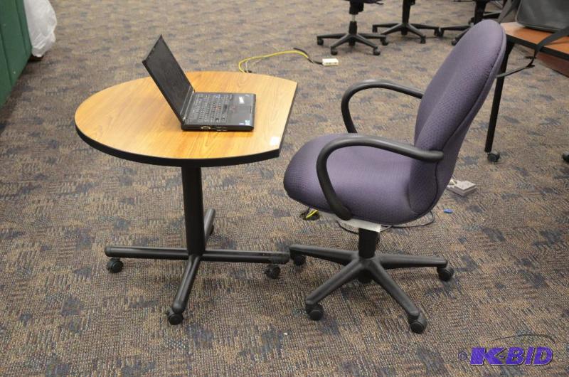 lot 142 image: desk  table 36" diameter, chair and lap...