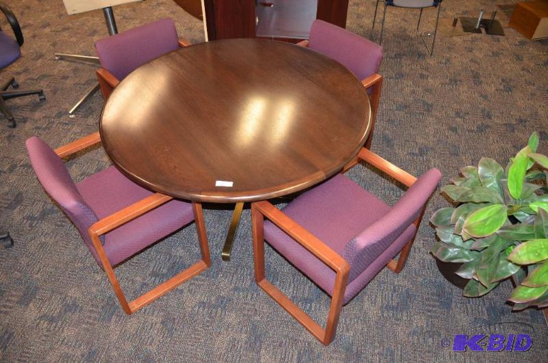 lot 149 image: Large wood table with 4 chairs. 54" diam...