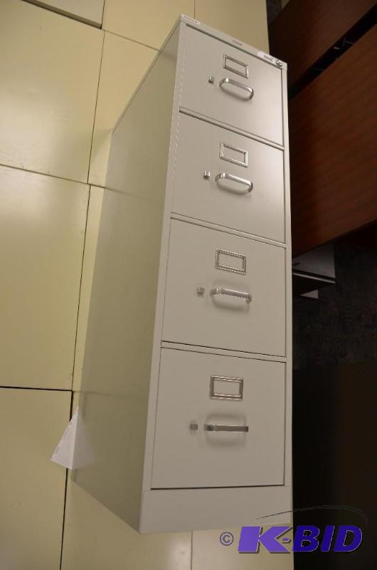 lot 182 image: 4 drawer Metal file cabinet 52x15x25"...