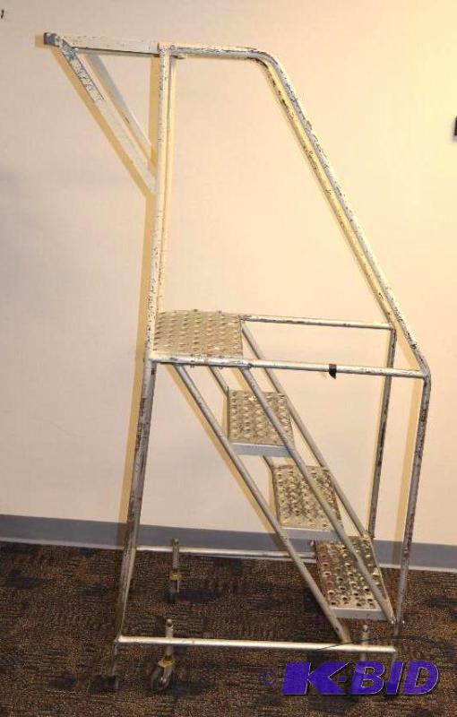 lot 188 image: 4 step standard rolling ladder 68" tall...