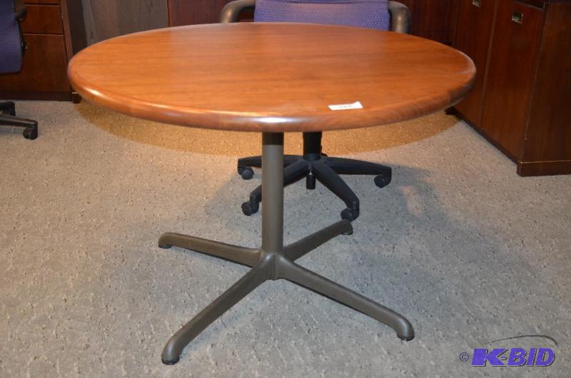 lot 22 image: Steelcase wood table 42" diameter...