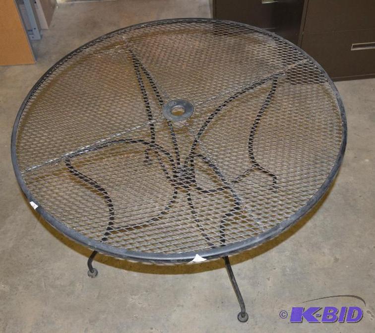 lot 90 image: Round metal patio table 42" diameter. Lo...