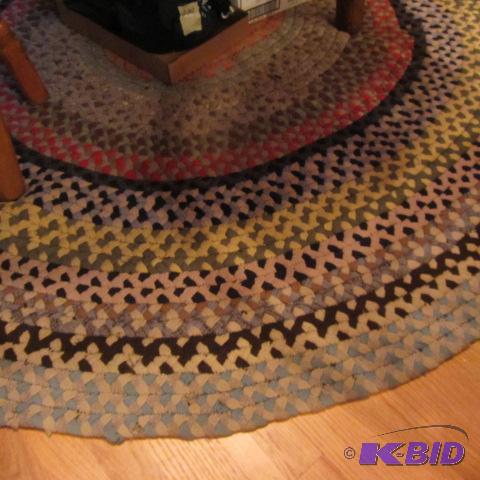 lot 233 image: Round Braided Rug