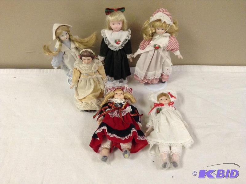 lot 21 image: 6 Story Book Type Porcelain Dolls