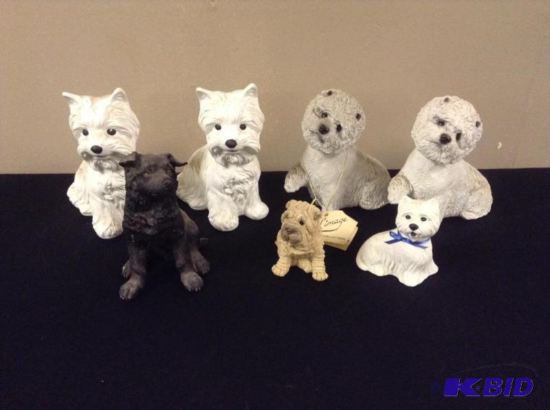 lot 45 image: Cute Dog Statues