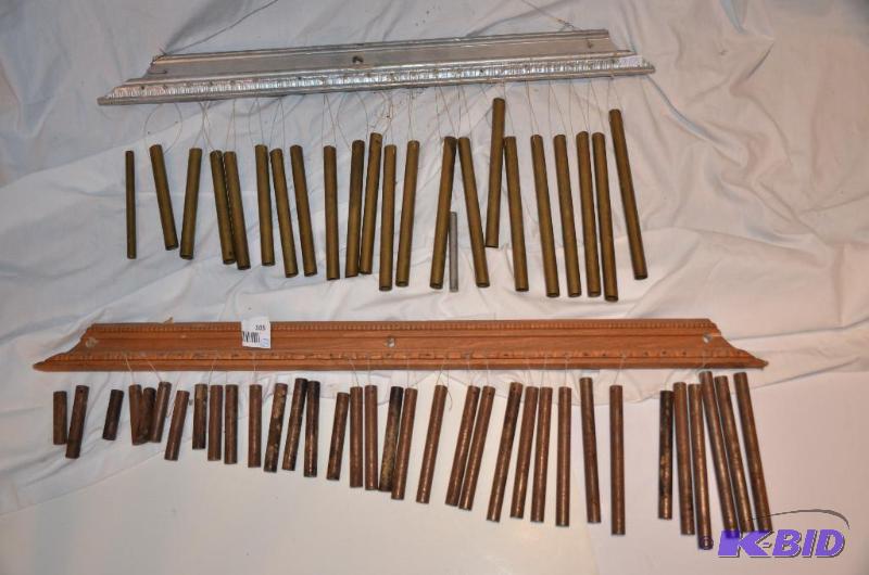 lot 105 image: 2 sets of wind chimes. one is solid iron 23x9...