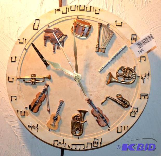 lot 161 image: wall clock with musical instruments as number...