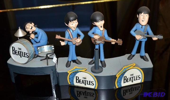 lot 75 image: The Beatles plastic figurines 8" tall...