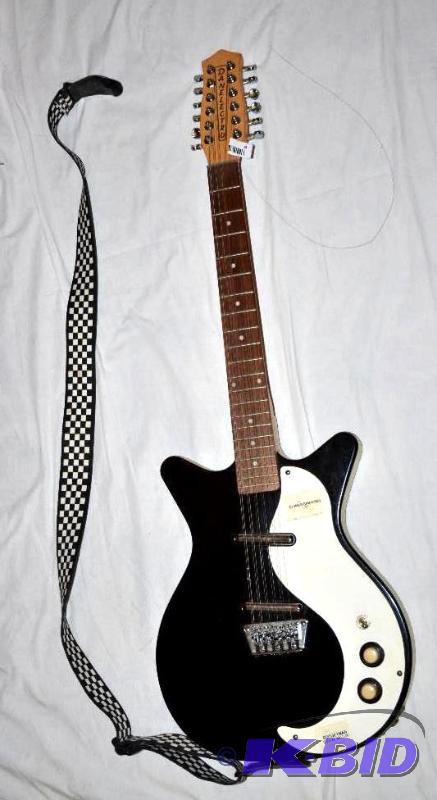 lot 8 image: Danelectro 12 string electric guitar We will ...