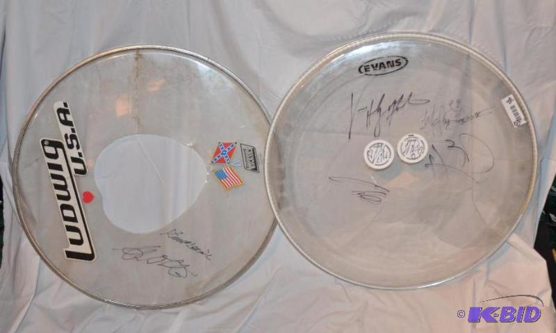 lot 88 image: 2 autographed drum heads by the group SEVENDU...