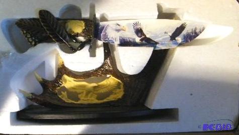 lot 41 image: Hand Painted Eagle Knife - Handle is carved r...