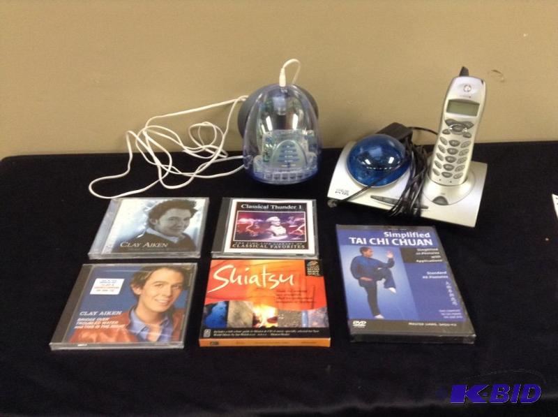 lot 127 image: A Couple of Gadgets and Relaxation CDs